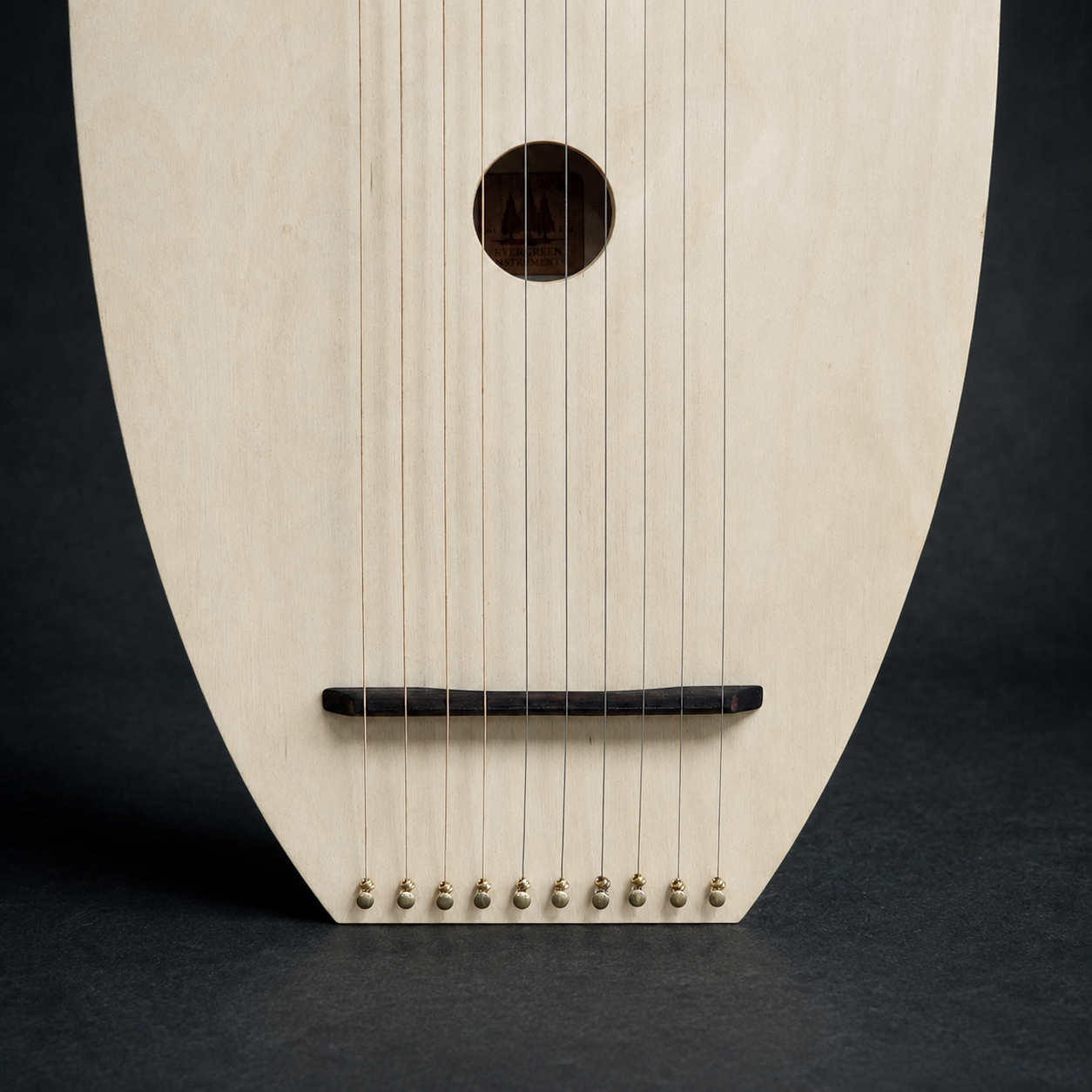 Close-up of the bridge and lower string anchors on David’s Harp