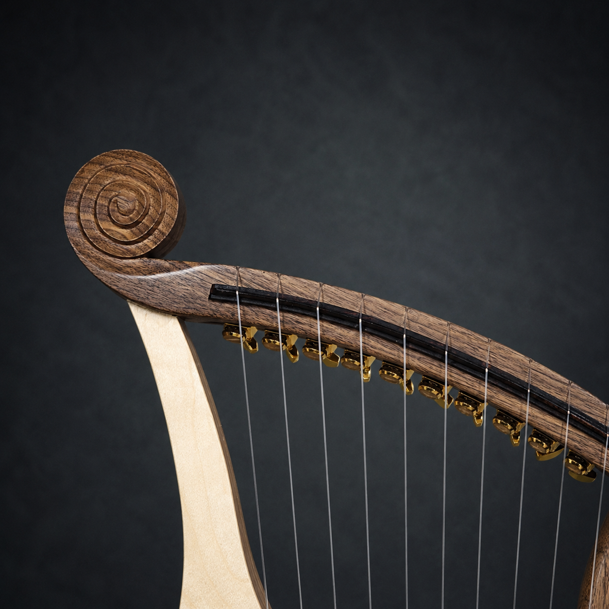 Close-up of the carved left scroll and geared tuners on the Harp of David