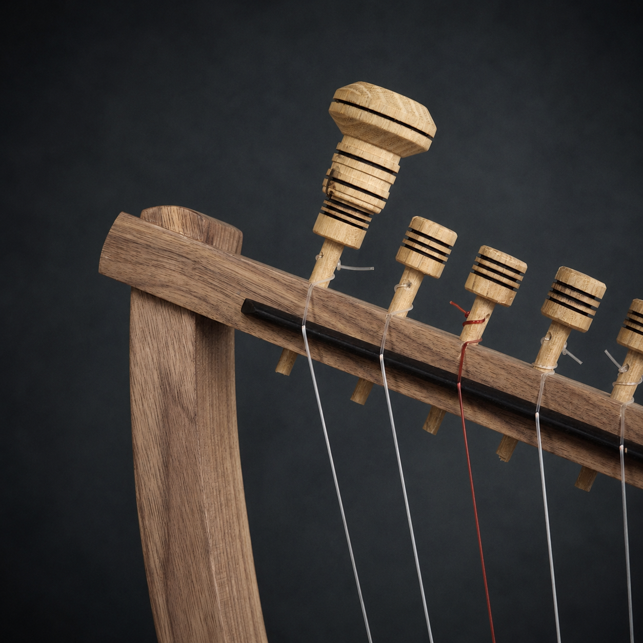 Wooden tuning key fitted to a hand-carved tuning peg on the Megiddo Harp